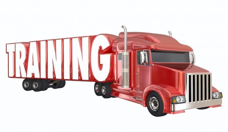 a red semi that says training
